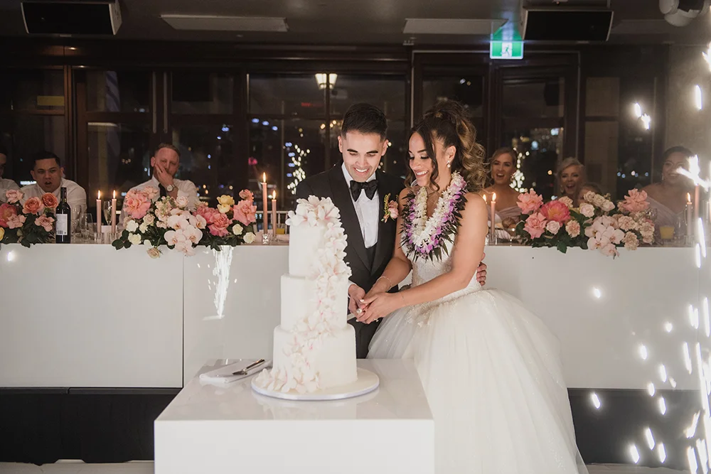 couple cutting cake at Dockside Darling Harbour reception venue