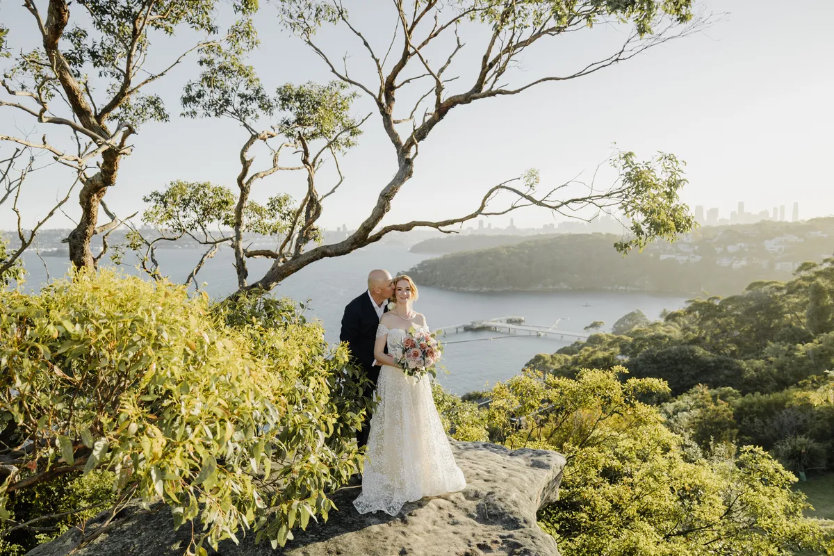 Wedding couple portrait at Gunners Barracks overlooking Sydney Harbour