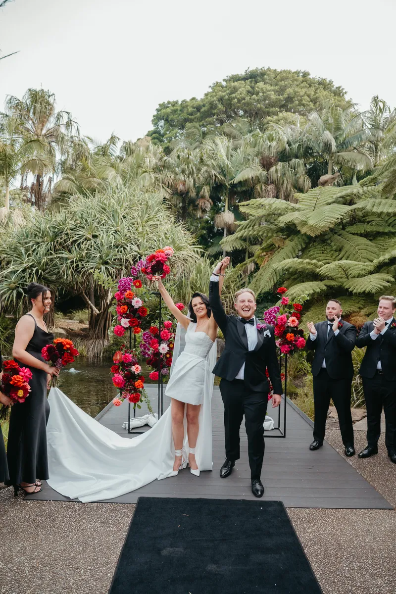Wedding party celebrating with bride and groom at Australian Botanic Garden Mount Annan