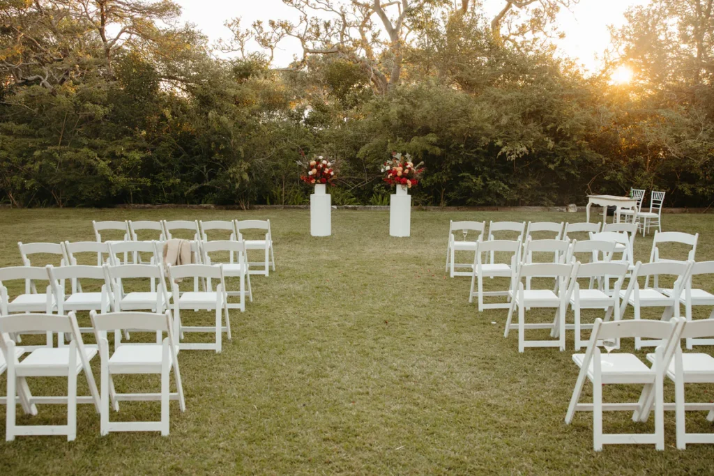 Athol Hall wedding ceremony setup on the lawn at sunset