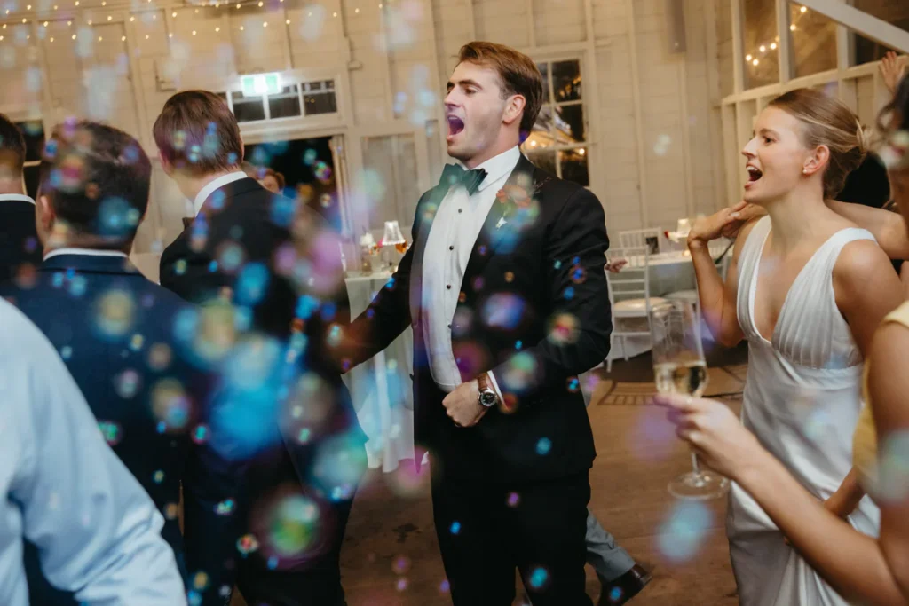 Wedding guests celebrating on the dance floor at Athol Hall Mosman